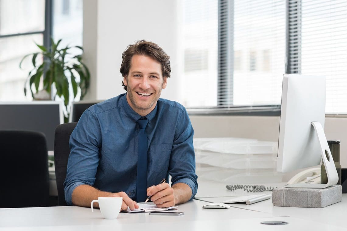 Man at desk in office