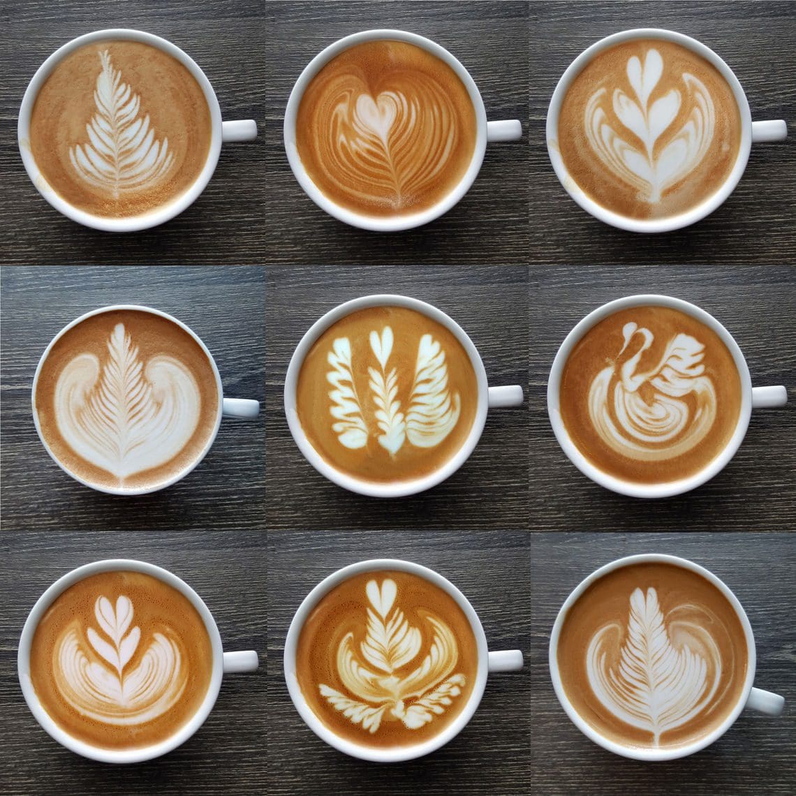 Latte art - nine cups of coffee all with different designs from the cream