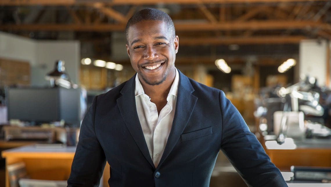 Business man with office in the background