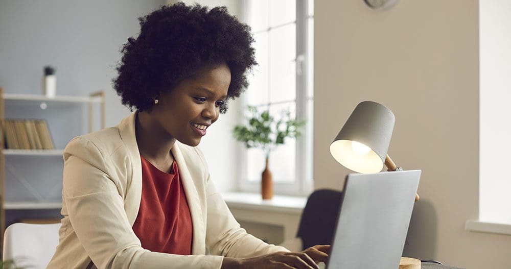 Business woman working on her laptop