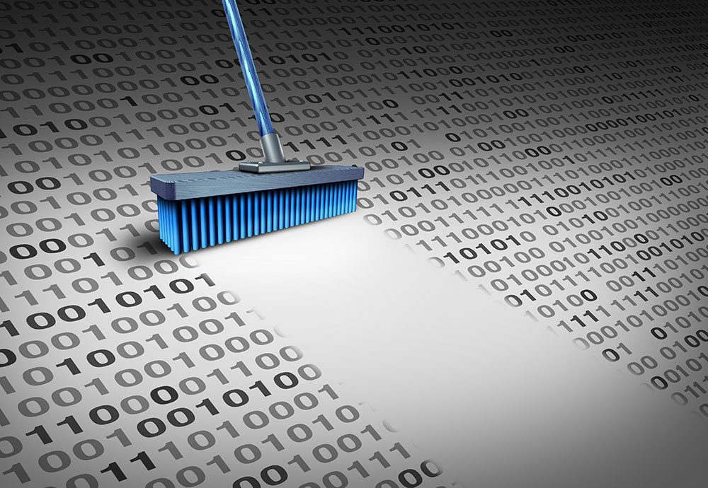 Erasing Data - broom shown sweeping away zeroes and ones