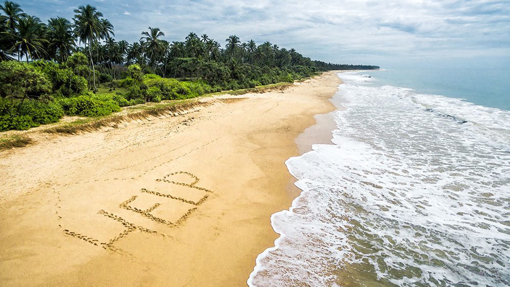 All things EOSL featured image - Deserted beach with the word Help written in the sand.